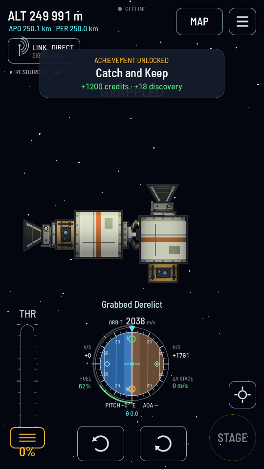 A probe-flown tug with its claw closed on the side of a crosswise fuel tank on a second ship, the toast reading Grabbed Derelict.