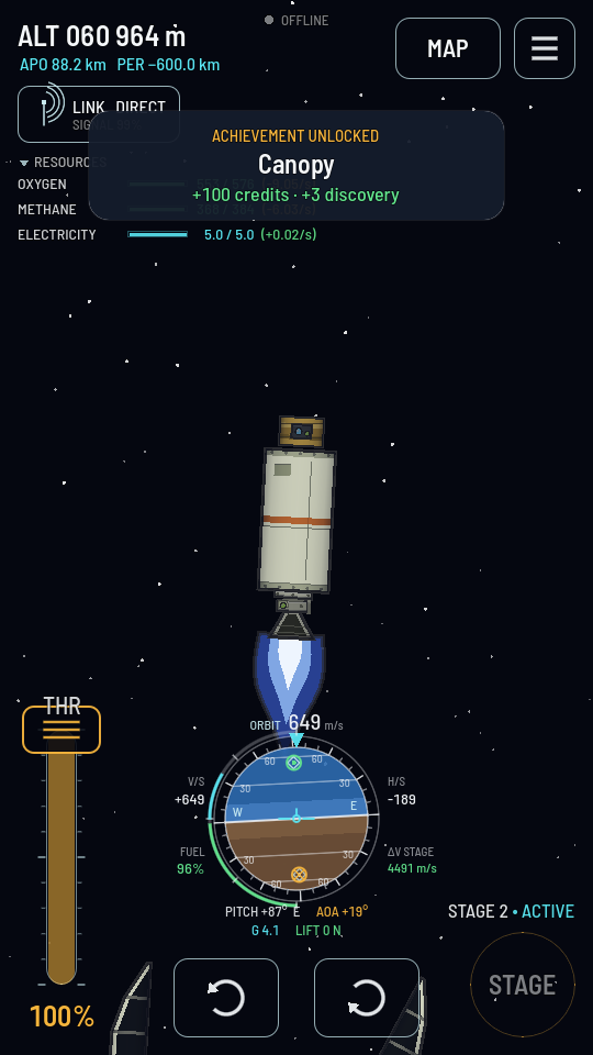 The flight view just after fairing separation, the two half shells tumbling away at the bottom corners of the screen and the satellite now bare on top of the stack.